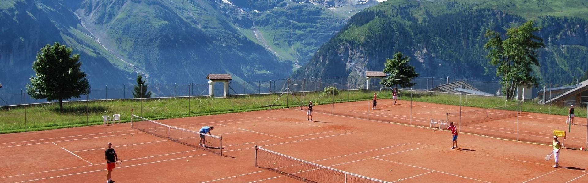 Stanglwirt Hotel outdoor clay tennis courts